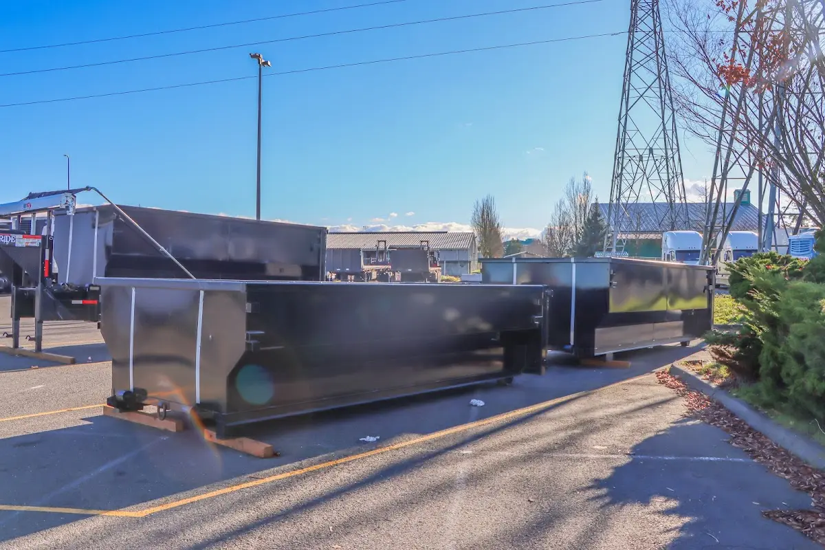 Roll-off dumpster ready for waste disposal at job site for Construction Dumpster Rental in Dover